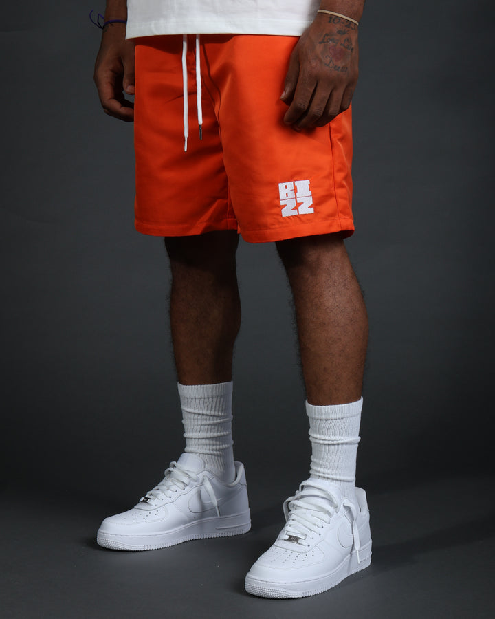 Club Shorts in Orange/White