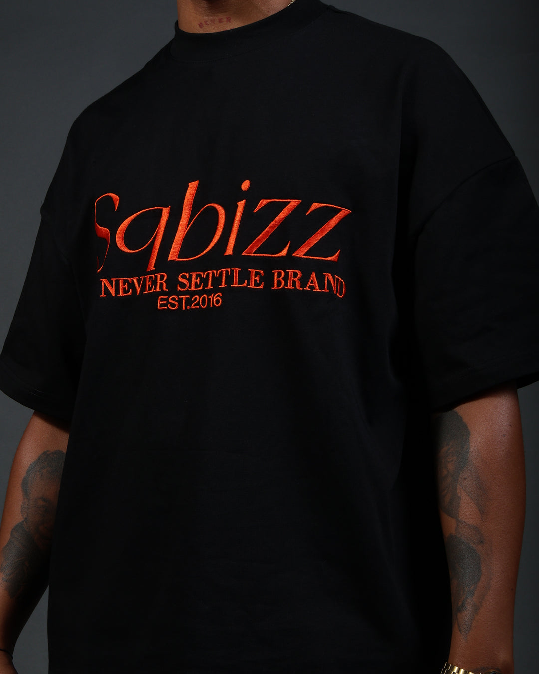 Prestige Tee in Black/Orange
