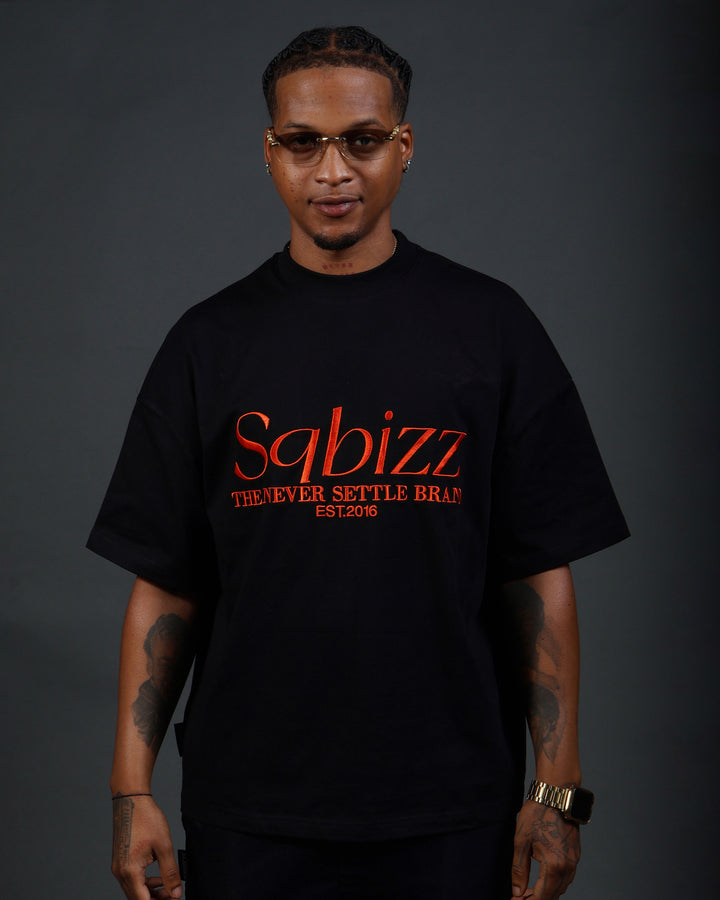 Prestige Tee in Black/Orange